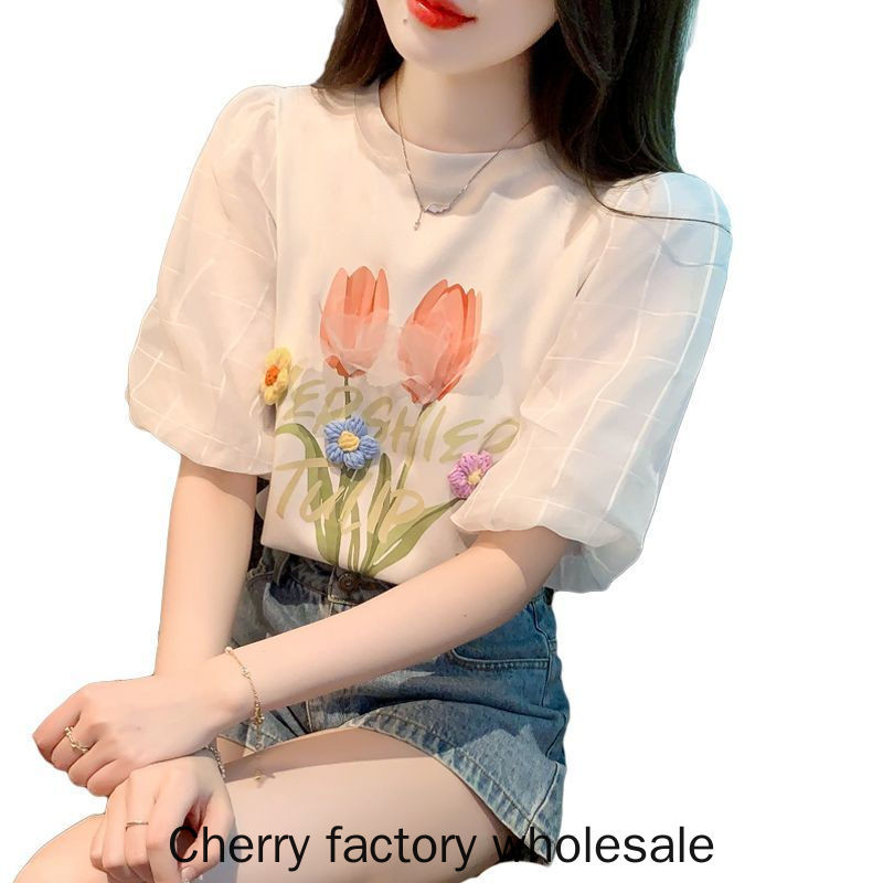 แฟชั่นผู้หญิงสไตล์ใหม่สีขาวพัฟแขนผ้าฝ้ายแท้แขนสั้นเสื้อยืดสามมิติดอกไม้อายุ @
