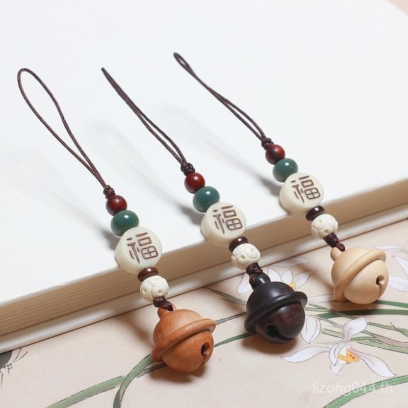 ของขวัญวันหยุดจี้กระเป๋า Bell รถผู้ชายผู้หญิงสไตล์ Ebony Boxwood แกะสลักพีชไม้โทรศัพท์มือถือ Handmad