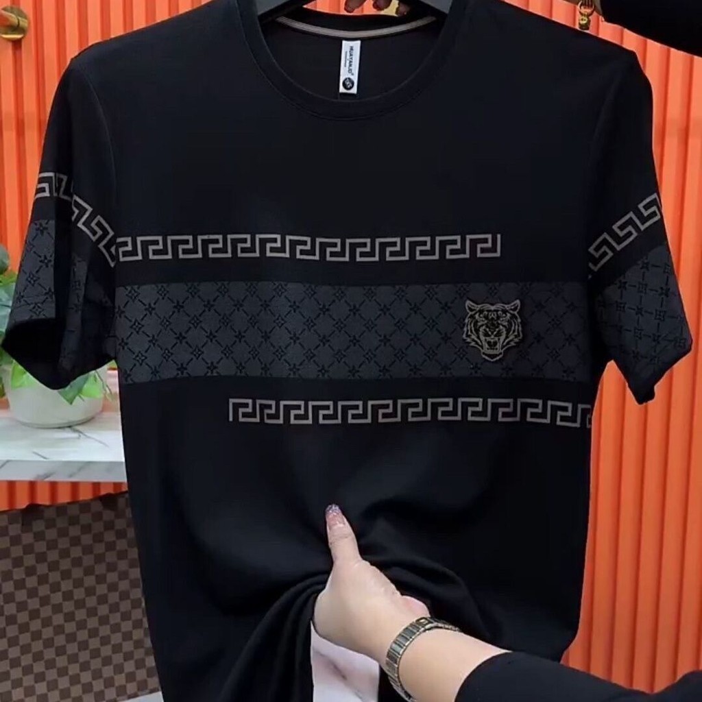 เสื้อยืดแขนสั้นผู้ชายพิมพ์ลายอินเทรนด์ใหม่