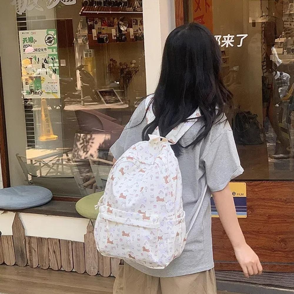 UUMIR กระเป๋าเป้สะพายหลังนักเรียนกระเป๋าเป้สะพายหลังผู้หญิงความจุขนาดใหญ่ปรับได้แฟชั่นลายการ์ตูนกระเป๋านักเรียนกันน้ํานักเรีย
