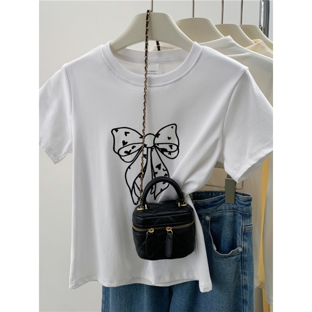 COD (กรุงเทพจัดส่งสินค้า) เสื้อยืดผู้หญิง พิมพ์ลายโบว์ แฟชั่นเกาหลี มินิมอล oversize ผ้าฝ้ายแบบนุ่มไม่หด ร้อนใหม่ฮิต280