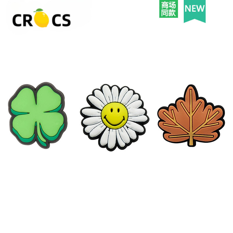 Crocs jibbitz charms Crocs รองเท้าอุปกรณ์เสริม High-End Sense รองเท้าหัวเข็มขัดอุปกรณ์เสริมพืชสีเขียว Maple Leaf Daisy รองเท้าดอกไม้เหมาะสําหรับ Crocs/Cross