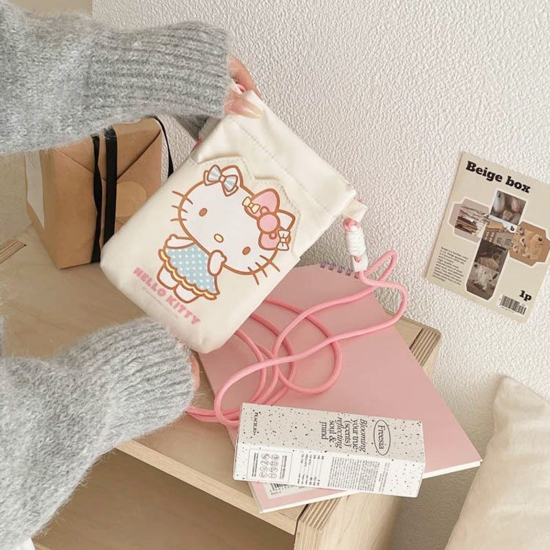 Hello Kitty Halter Bag กระเป๋าใส่มือถือและเหรียญ การ์ตูน.Crossbody ออกแบบป้องกันหายและปลอดภัย เหมาะสำหรับใช้งานในวันธรรมดาหรืองานเลี้ยง - รูปที่ 3