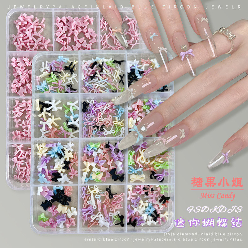 12 ตารางที่มีสีสันมินิโบว์เล็บอุปกรณ์เสริมขนาดใหญ่ขนาดเล็กผสมสีดําสีขาวสีชมพูโบว์ผูกสวมใส่เล็บอุปกรณ์เสริม