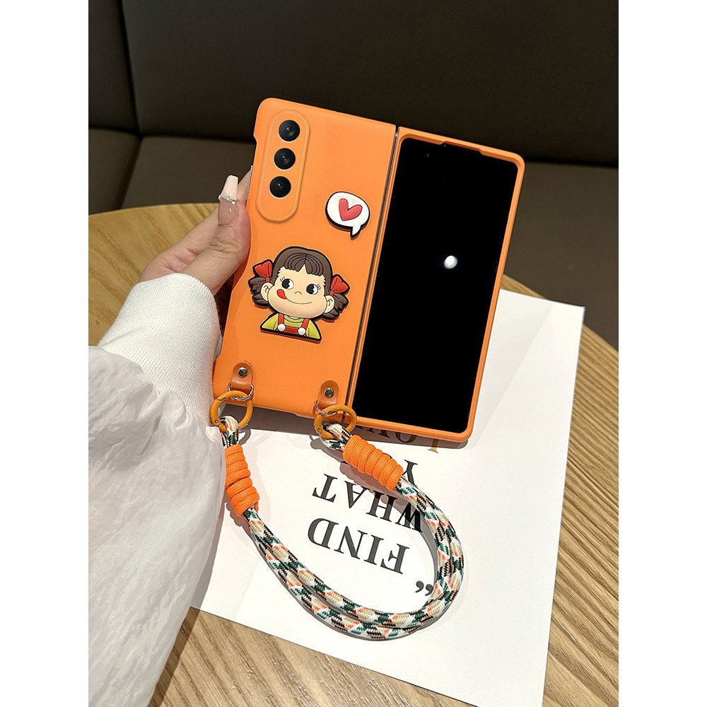 SAMSUNG แฟชั่นเกาหลีการ์ตูนหัวใจรักฟูจิยะนมสาวสีส้มเคลือบเคสโทรศัพท์ที่มีสายคล้องมือแบบพกพาสําหรับ ซัมซุง กาแลคซี Z พับ 6 5 4 3 2 5ก