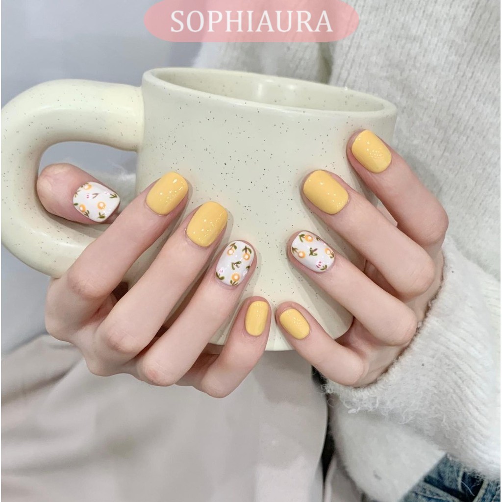 โซโปฮีอารา เล็บทําด้วยมือสั้นสุดสีเหลืองธรรมดาออกแบบหรูหราหรูหราหรูหรานักเรียนวัยรุ่นนํามาใช้ใหม่นาทรัลเล็บปลอมที่ทําด้วยมือกดบนเล็บเล็บปลอมเล็บ