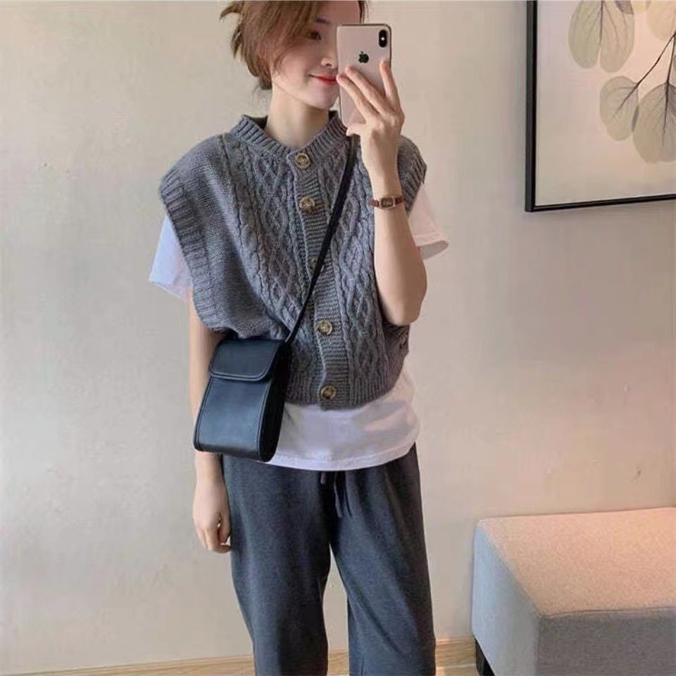 ฤดูใบไม้ร่วงผ้าวูลสีล้วนคอกลมใส่ด้านนอกสำหรับใส่ในพร็อพเข็มกลัดหนาเสื้อแขนกุดสไตล์เกาหลีเรียบสบายสำหรับผู้หญิง
