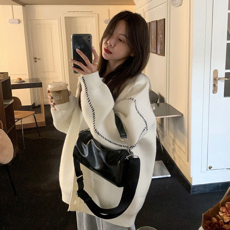 เสื้อกันหนาวหญิงสีขาวถักหญิงฤดูใบไม้ร่วงฤดูหนาวใหม่เวอร์ชั่นเกาหลีสบายๆหลวมขี้เกียจลมการออกแบบความรู้สึกสวมใส่น้ํา