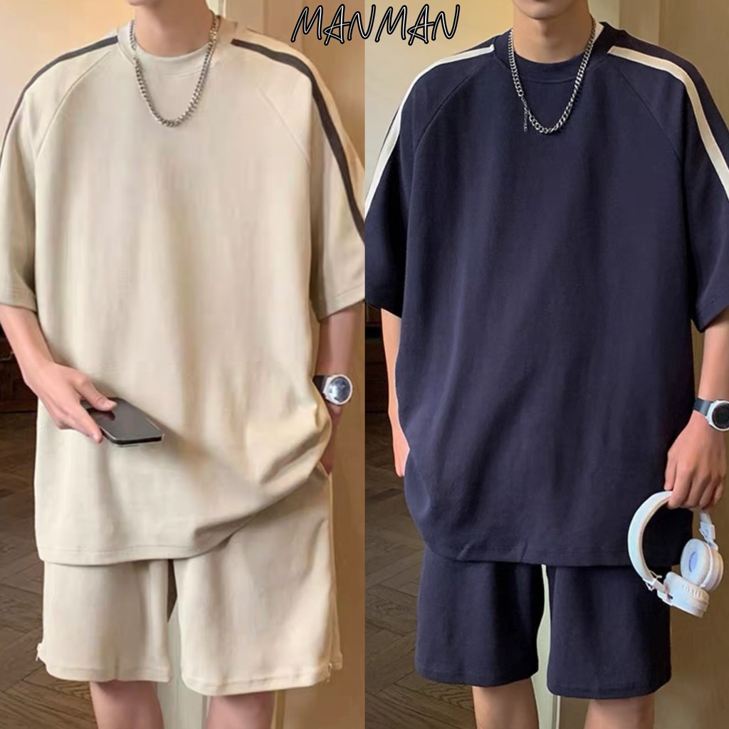 MANMAN เสื้อยืดผู้ชาย ผ้าวาฟเฟิลด์ เสื้อลำลอง คอกลมแขนสั้น ชุดคู่รัก แบบหลวม เย็บติดกัน แมทช์ลุคง่าย