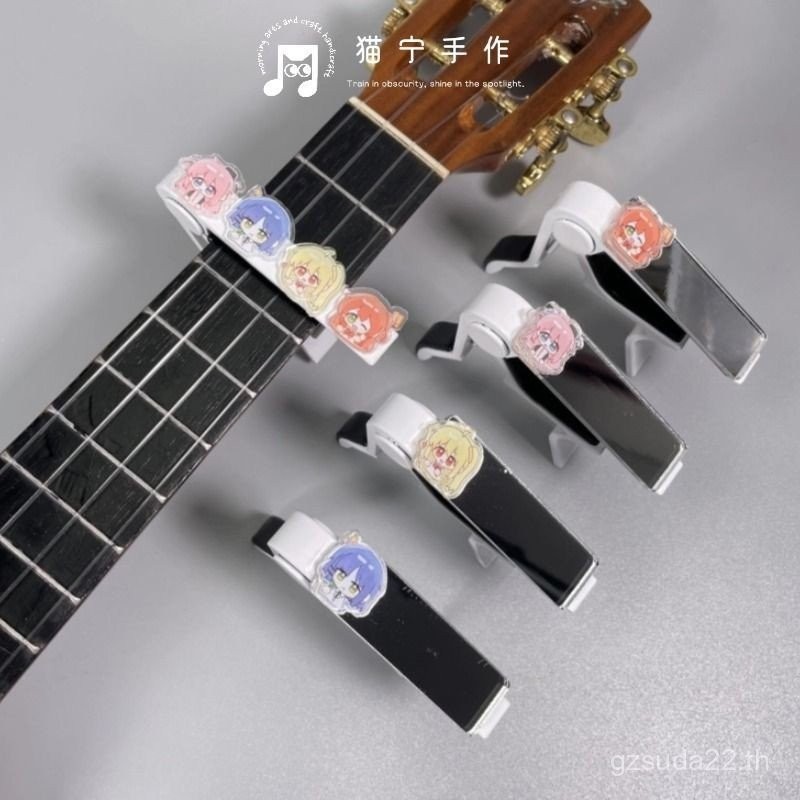 กีต้าร์โปร่ง Capo กีต้าร์โปร่งไฟฟ้า Ukulele Capo Tuner Lonely Rock Belongs to Capo UTA6