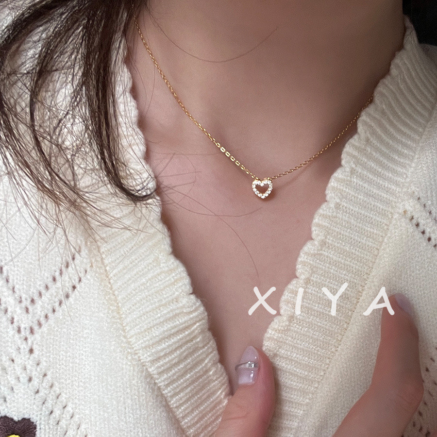 Xiya สร้อยคอหัวใจเพชรขนาดเล็กประณีตสร้อยคอหัวใจกลวงทุกคู่