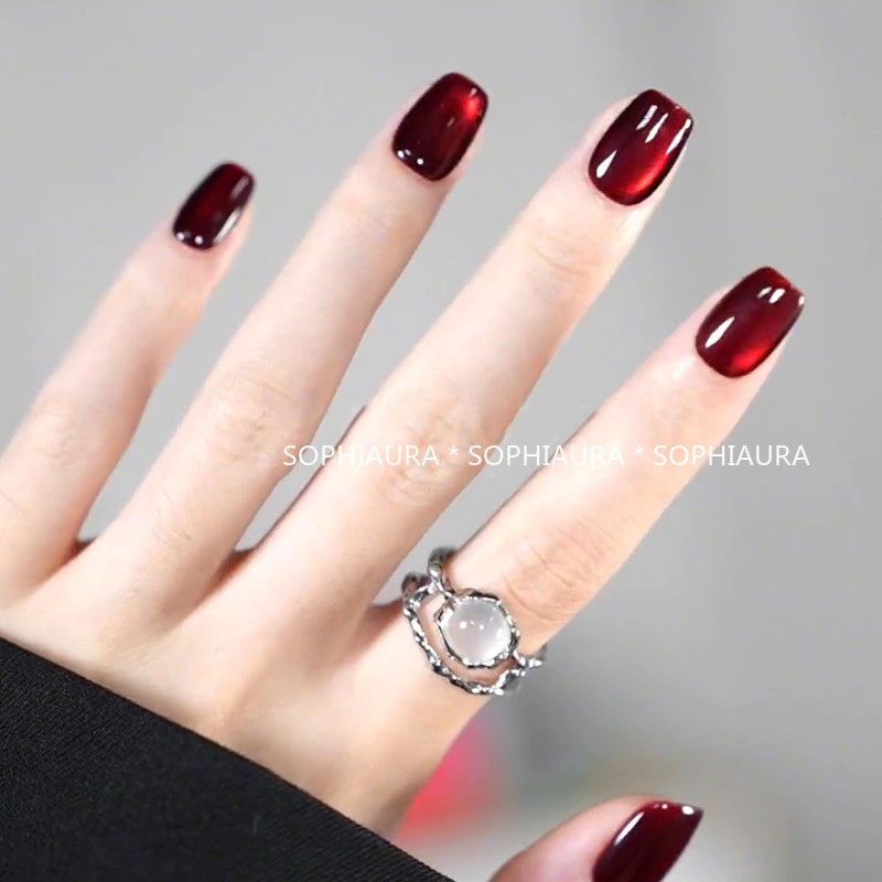 [กาวฟรี] ฟรีกาวเล็บปลอมกดบนเล็บด้วยกาวเล็บปลอม Cat Eye Plain Design Rhinestone Design Maroon White Black Red Blue Pink Violet