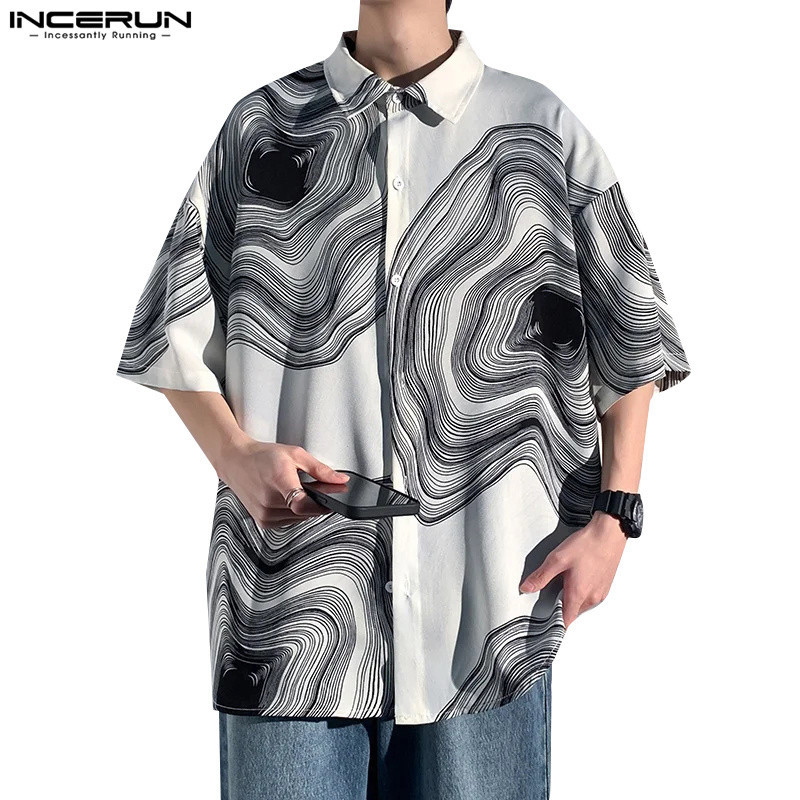 ไม่แน่นอน เสื้อไหล่ลงระลอกน้ําสําหรับผู้ชาย