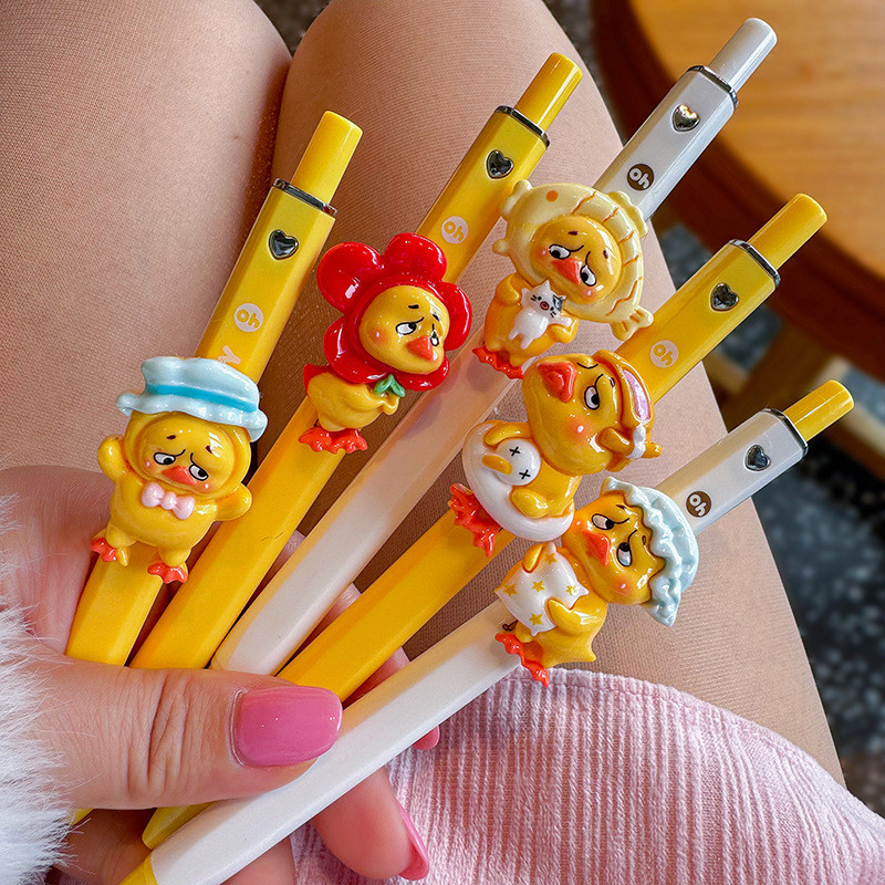 ปากกาลูกลื่นการ์ตูนน่ารักเป็ดน้อยสีเหลืองนักเรียนปากกาเจล