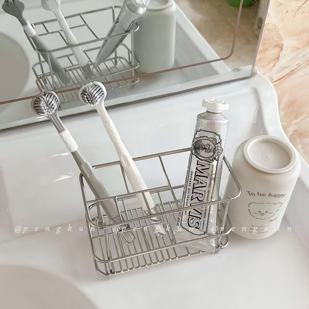 ชั้นวางแปรงสีฟันสแตนเลสห้องน้ําในครัวเรือนอ่างล้างหน้าฟันถ้วยยาสีฟันปาก