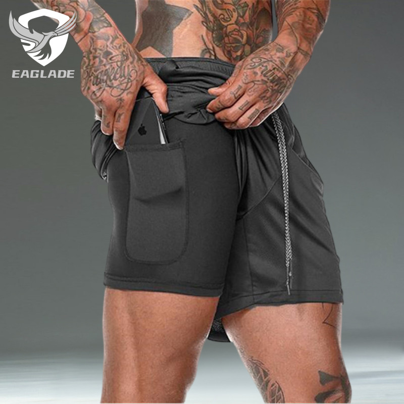 กางเกงขาสั้นสำหรับวิ่ง EAGLADE สีดำ ออกแบบมาให้มีความยืดหยุ่นสูง เหมาะสำหรับการออกกำลังกายของคุณ