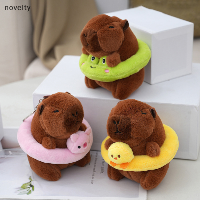 Nly การ์ตูน Capybara ตุ๊กตาพวงกุญแจกระเป๋าจี้แขวนตกแต่งน่ารักตุ๊กตาตุ๊กตาของเล่นเดสก์ท็อปตุ๊กตาเครื่องประดับพวงกุญแจรถเด็กของขวัญ N