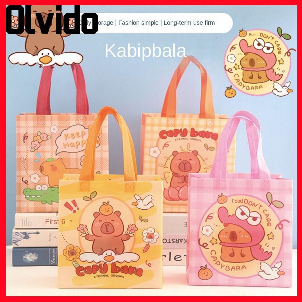 กระเป๋าโท้ต OLVIDO Capybara, ถุงของขวัญขนมพับได้แบบพกพา, ผ้าไม่ทอกระเป๋าถือการ์ตูน