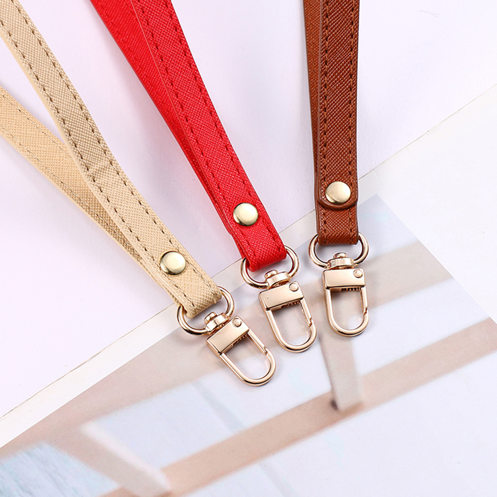 สายคล้องนาฬิกาข้อมือผู้หญิง หนังสีทึบ ปรับขนาดได้ พร้อมใช้งานเป็นสายคล้องกระเป๋าสตางค์และเข็มขัด - รูปที่ 7