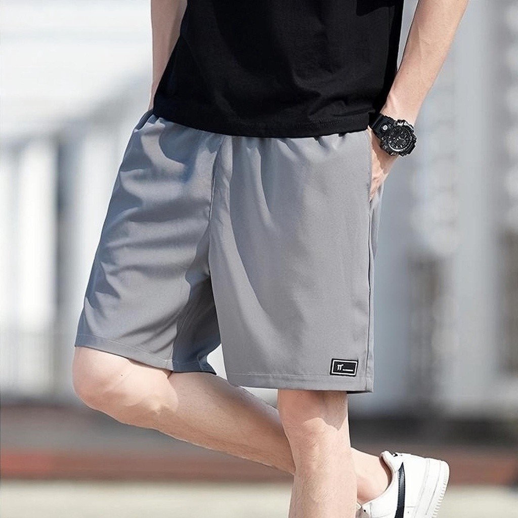 MANMAN ผู้ชายฤดูร้อน อินเทรนด์เรียบง่าย ผ้าฝ้ายแท้สีล้วน กางเกงขาสั้นทรงตรง