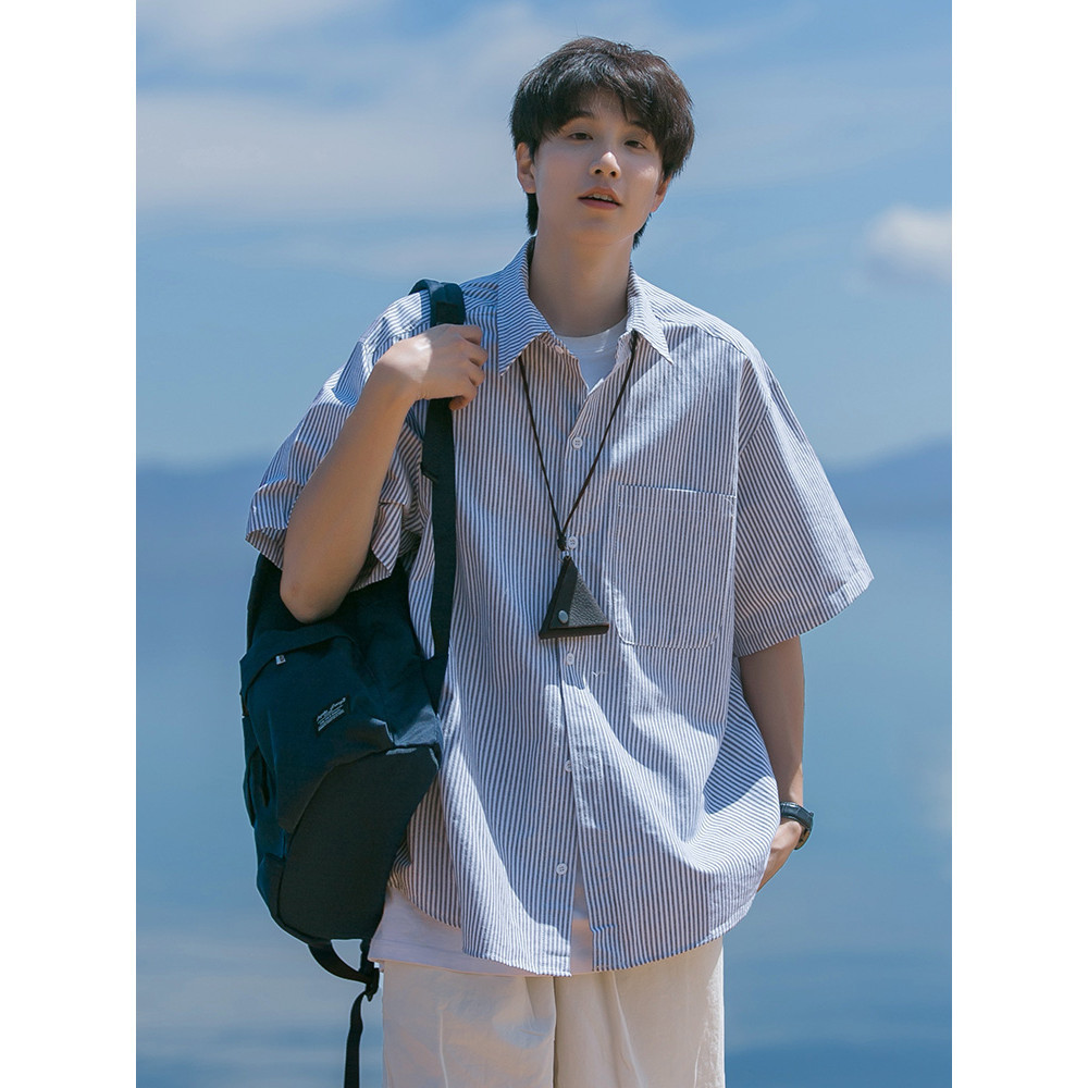 ฤดูร้อนสไตล์ใหม่หลวมสบายๆสีฟ้าสีขาวเสื้อเชิ้ตลายทาง