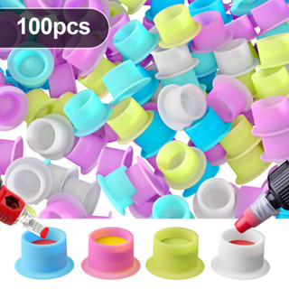 100ชิ้นทิ้งซิลิโคนสักหมึกถ้วยน้ําถาวรแต่งหน้าสีคอนเทนเนอร์หม…