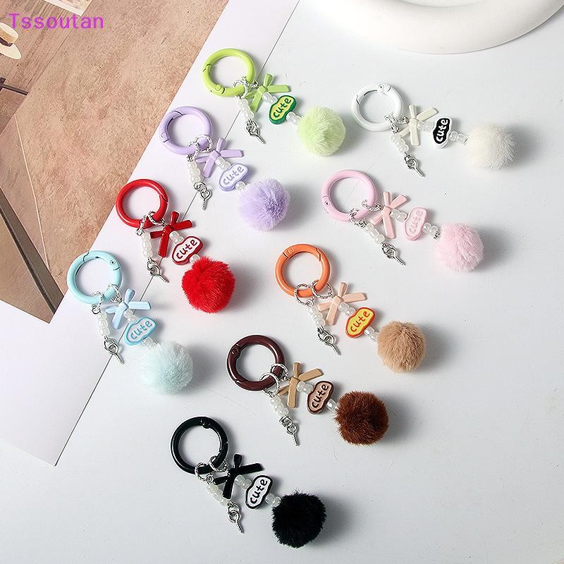 [TSST] น่ารัก Simple Hairball จี้พวงกุญแจสําหรับผู้หญิงสาวสีสัน Pompom Charm พวงกุญแจกระเป๋าเป้สะพายหลังอุปกรณ์ตกแต่งของขวัญ TAN