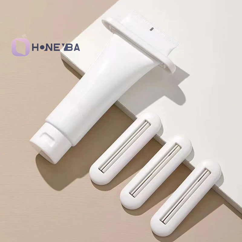 <Honeyby> เครื่องบีบยาสีฟัน, คลิปยาสีฟัน, น้ํายาทําความสะอาดผิวหน้าที่คั้นครีมทามือ, เครื่องบีบยาสีฟันแบบใช้มือในครัวเรือน Nice