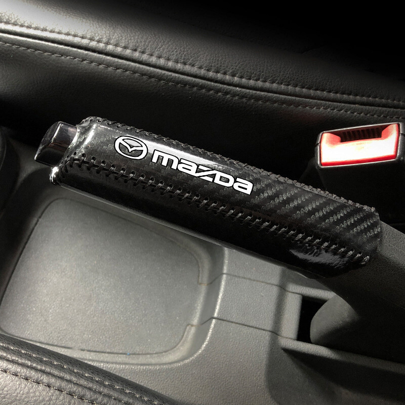 คาร์บอนไฟเบอร์รถหนัง Handbrake ฝาครอบแขนป้องกันเบรคมือสําหรับ Mazda 2 3 6 323 CX3 CX4 CX5 CX8 CX30 BT50