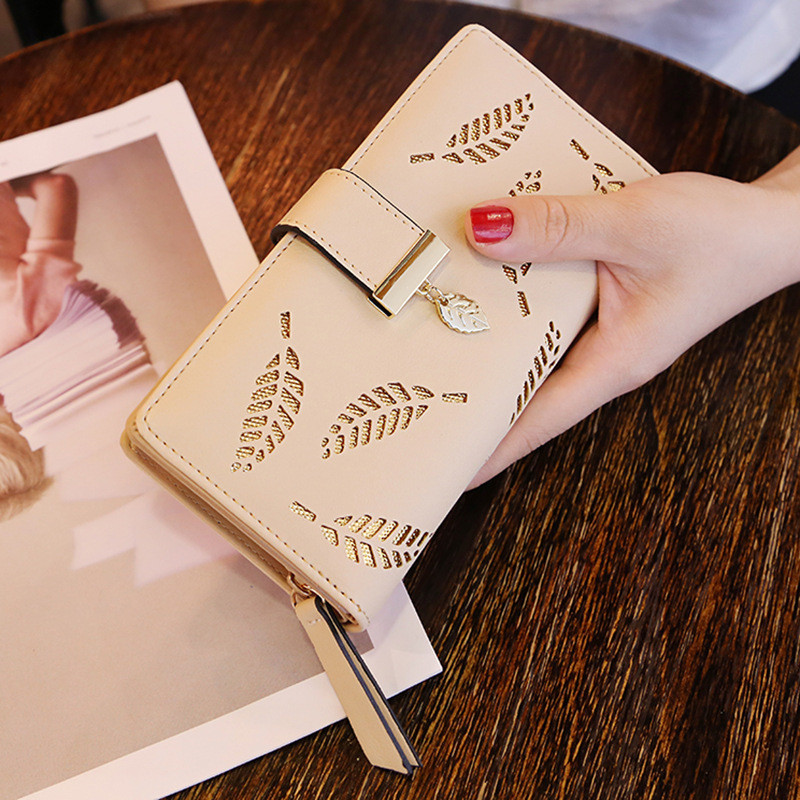 กระเป๋าสตางค์ใบยาวผู้หญิงแฟชั่น Hollowed-out Leaf-Shaped Zipper Hasp Wallet