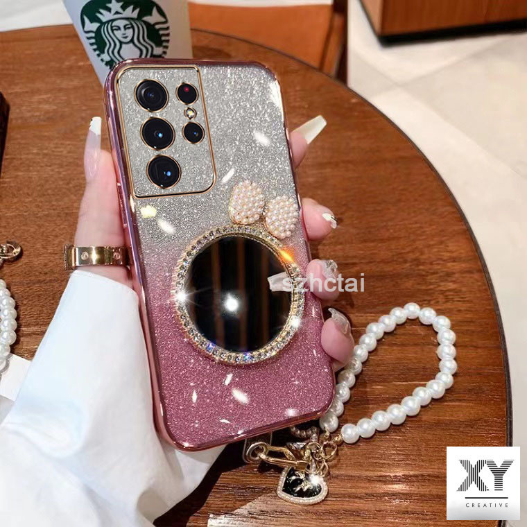 เคส samsung s23 plus s23 ultra s23fe s23 แวววาว เปลือก ล้างเปลือกหอยมุกโบว์กระจกแต่งหน้า พร้อมสร้อยข้อมือสําหรับเด็กผู้หญิง เคสโทรศัพท์ samsung s23 plus s23 ultra s23fe s23