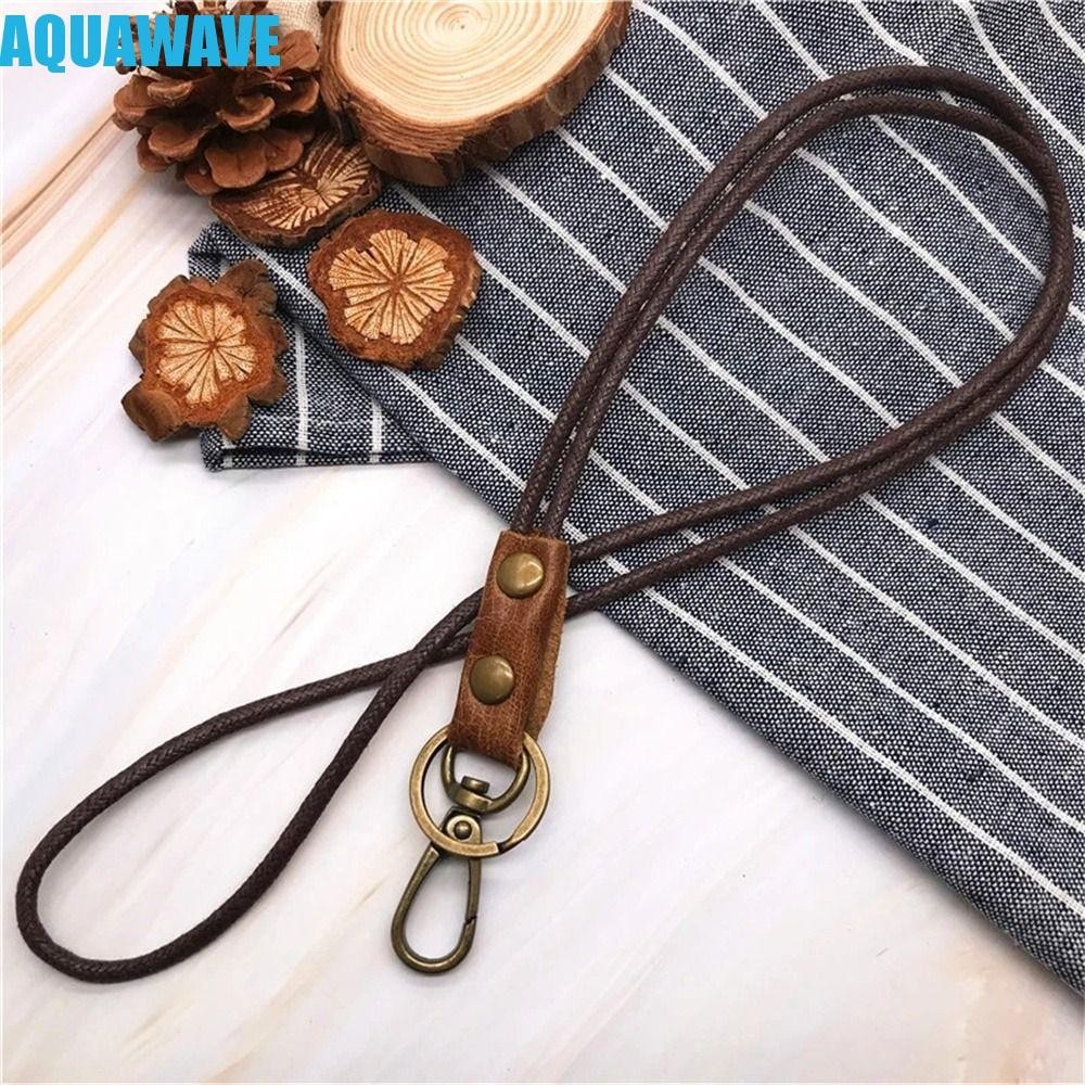 คลื่นน้ํา เชือกเส้นเล็กหนังสําหรับโทรศัพท์มือถือแฟชั่น รหัส ผู้ถือบัตรพวงกุญแจหนังแท้ผู้ถือป้ายโทรศัพท์สายคล้องคอ