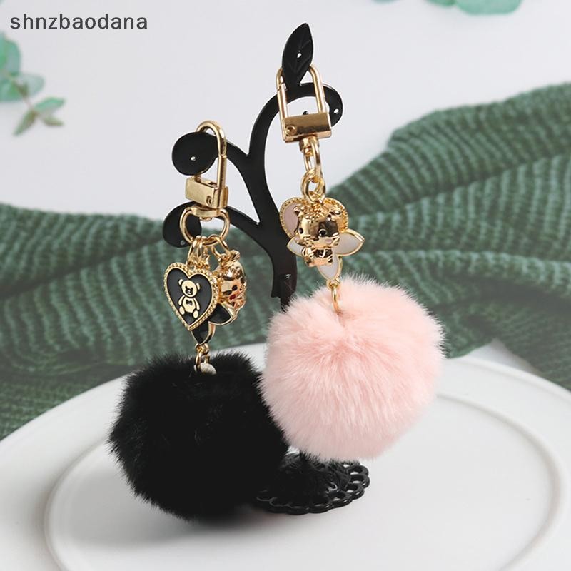 [SHNZAA] Ins ใหม่ Kawaii Love Bear สีชมพูสีดํา Pompom พวงกุญแจกระเป๋าสุภาพสตรีจี้รถ Key Holder สาวพวงกุญแจ Ch อุปกรณ์เสริมของขวัญ FSSG