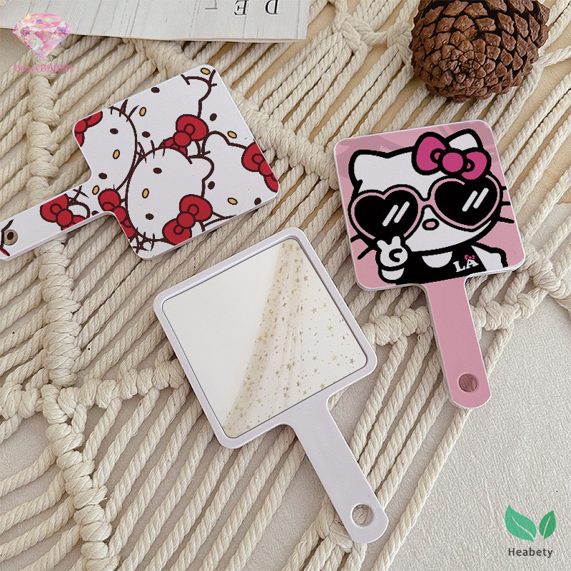 Heabety แบบพกพา Sanrio Hello Kitty Kawaii การ์ตูนกระจกแต่งหน้ามือถือ Travel Clearness ความงามเครื่องมือของขวัญสําหรับเด็กผู้หญิงใหม่