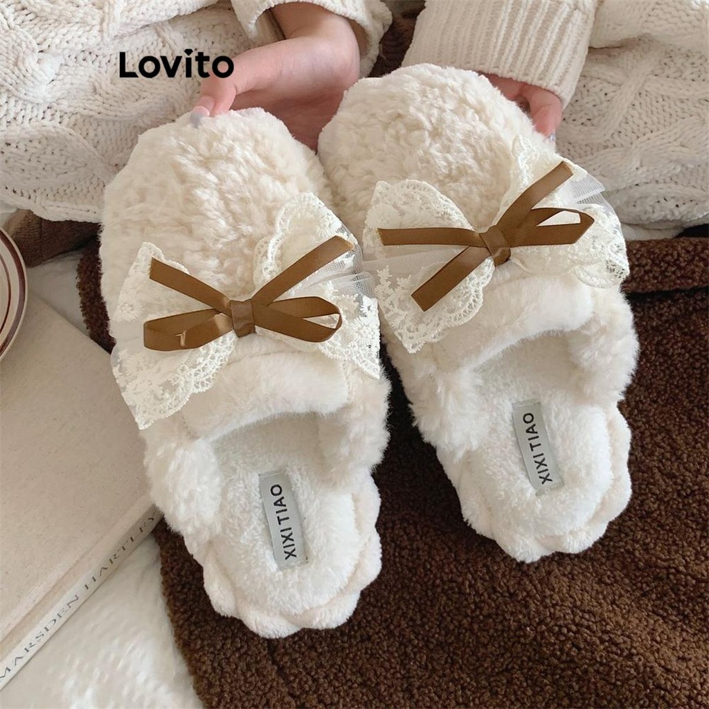 Lovito รองเท้าแตะแบบเรียบ ผูกโบว์ธรรมดา ใส่สบาย เนื้อผ้าดี รองเท้าแตะแบนสำหรับผู้หญิง LFA45377