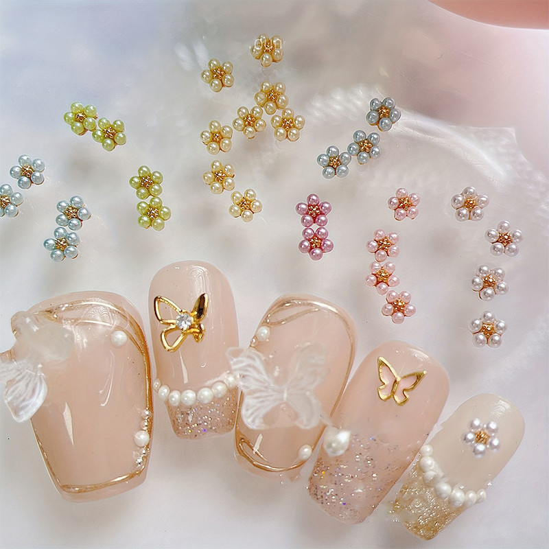 10ชิ้นมินิสีชมพูสีขาวมุกรูปดอกไม้เสน่ห์3ง ตกแต่งเล็บที่มีสีสันเล็บอุปกรณ์เสริม