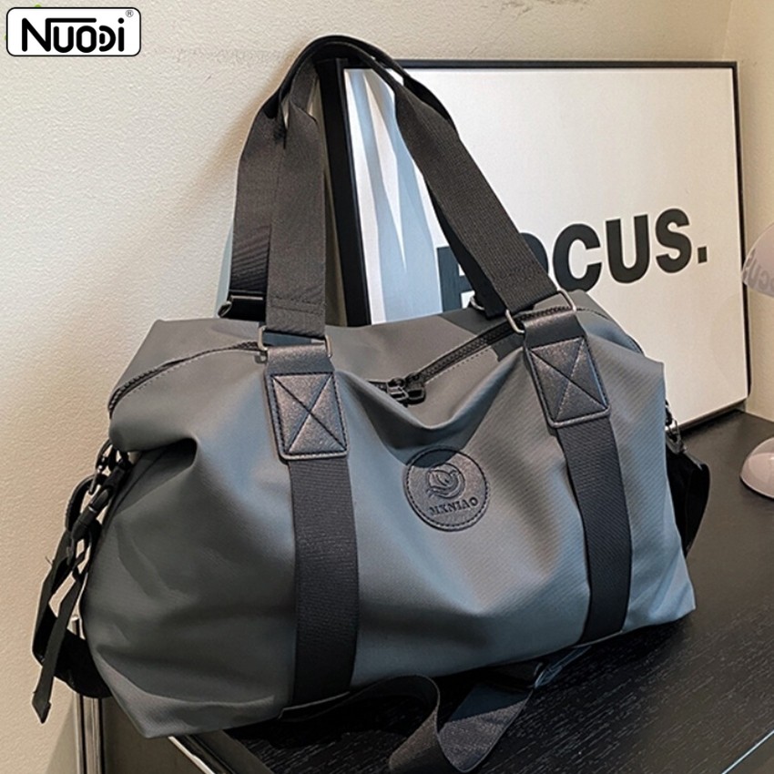 Nuodi กระเป๋าเดินทาง ถือได้ สะพายข้างได้ ใส่เสื้อผ้า มีหลายช่อง จุของได้เยอะ แข็งแรงและทนทาน เดินทางสะดวก
