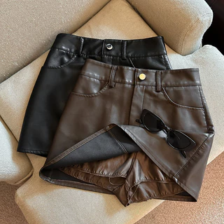 ฤดูใบไม้ร่วงฤดูหนาว PU หนัง A-line กระโปรงผู้หญิงเอวสูง Slim Fit สะโพกกอดกระโปรงสั้นขนาดใหญ่ S-4XL