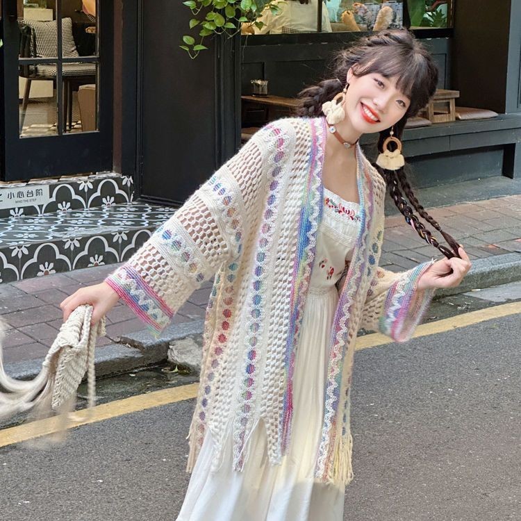 ชวนซี ซินเจียงทิเบตชิงไห่ท่องเที่ยวสวมใส่ย้อนยุคสไตล์ชาติพันธุ์ผ้าคลุมไหล่หลวมกลวงถักคาร์ดิแกนผู้หญิงแจ็คเก็ต