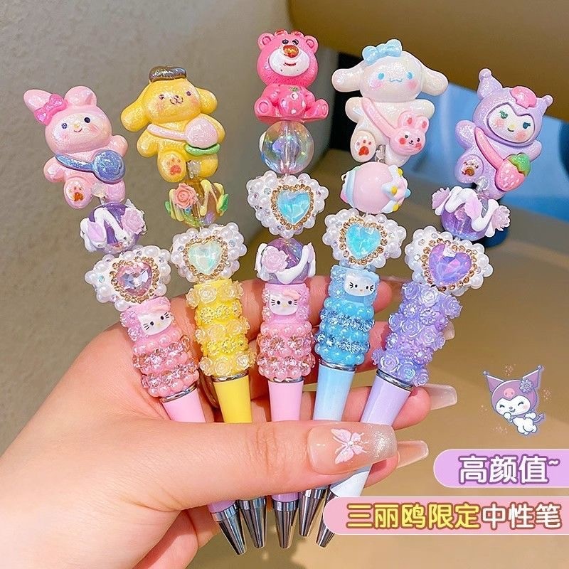 ปากกาลูกลื่นการ์ตูนน่ารักปากกาลูกปัดคริสตัลแฟลชเพชรหมุนปากกาเจลเติมสีดำเครื่องเขียนนักเรียน