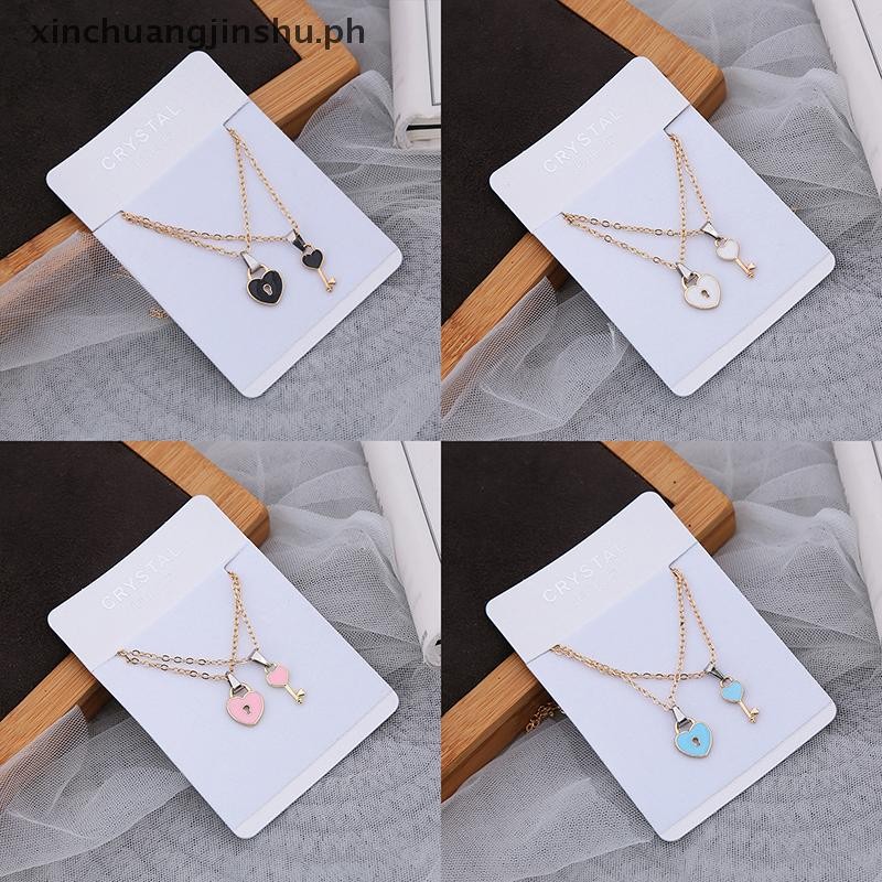 XIN 2 ชิ้น/เซ็ตสร้อยคอคู่สําหรับผู้หญิงผู้ชายโรแมนติกกุญแจล็อคหัวใจจี้สร้อยคอ PH