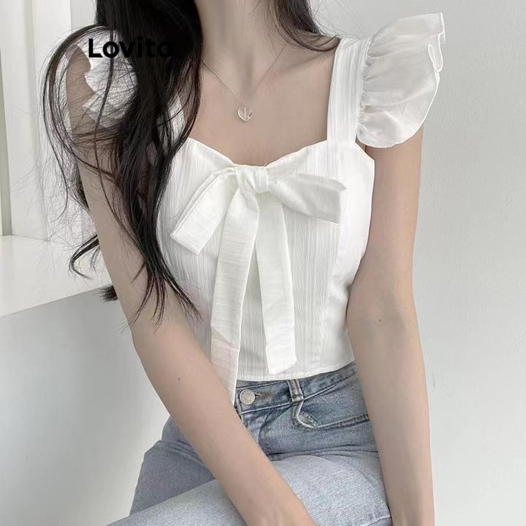 Lovito เสื้อแขนกุดผู้หญิง แต่งโบว์ สีพื้น สไตล์ลำลอง LNA59162