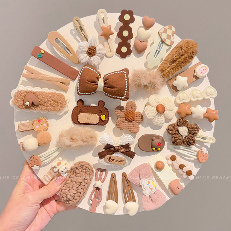 12ชิ้นเด็กตุ๊กตาน่ารักกิ๊บสาวหน้าผากด้านผมหักเรียบคลิปน่าร รูปที่ 2
