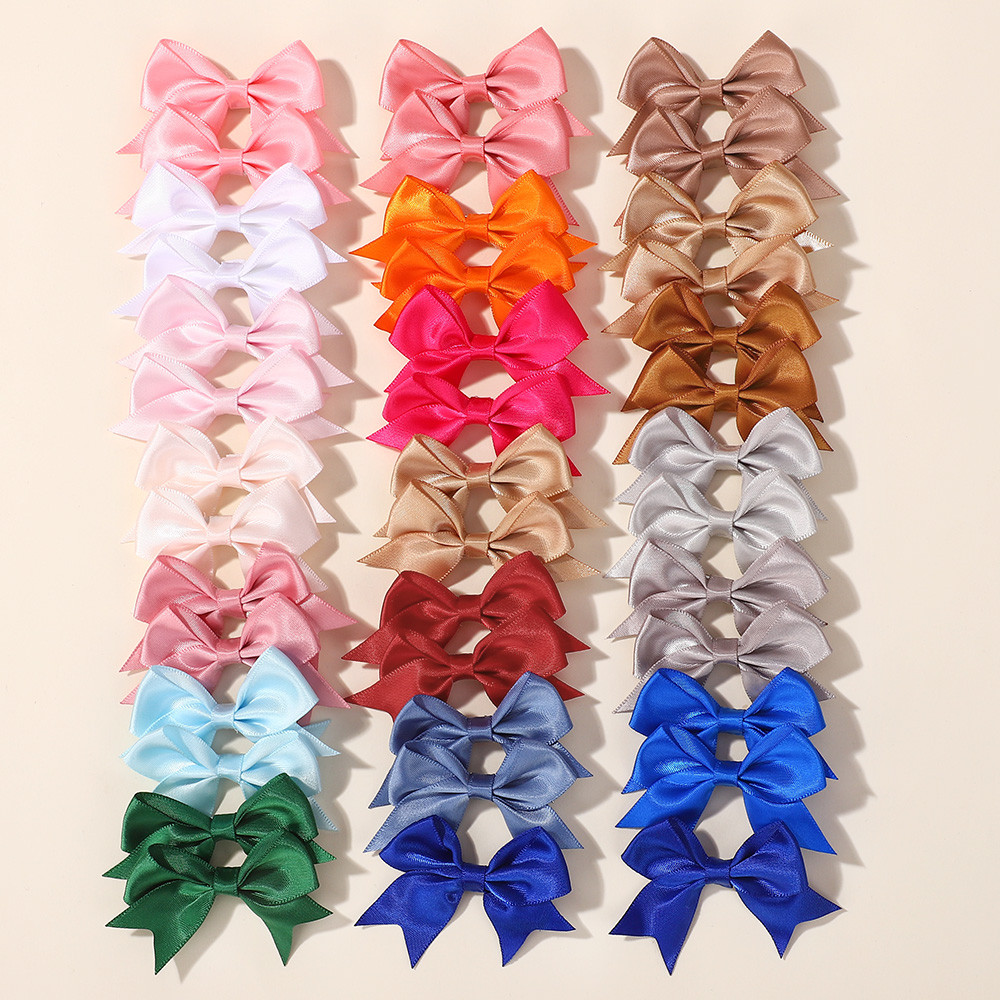 ริบบิ้นติดผมสไตล์swallowtail 40ชิ้น/ล็อต เหมาะสำหรับเป็นอุปกรณ์เสริมทรงผมสำหรับเด็กผู้หญิง