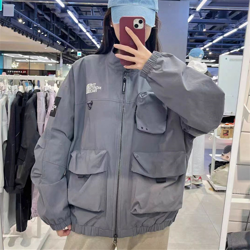 ปักโลโก้กีฬากลางแจ้งเสื้อแจ็คเก็ตกันลมคอตั้งคู่รัก