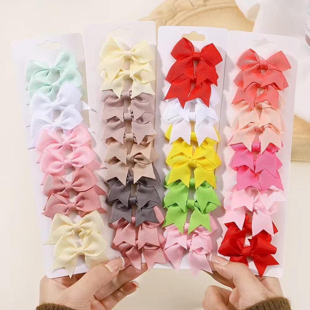 10 ชิ้น/ล็อตสีทึบริบบิ้นเด็ก Bows กิ๊บติดผมสําหรับเด็กทารก Handmade Bowknot Hairpin MiNi Barrettes เด็กอุปกรณ์เสริมผม