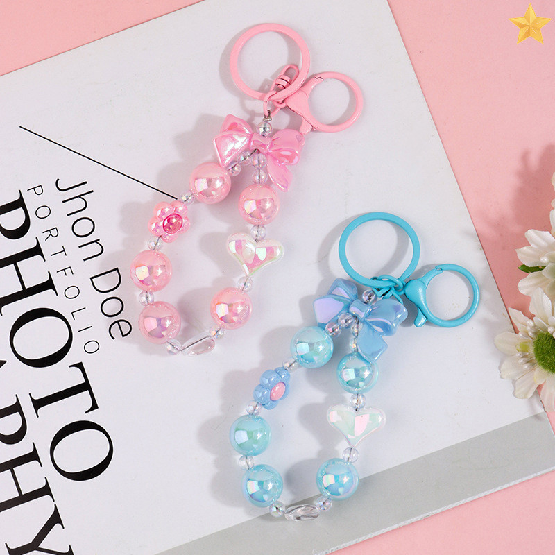 [FL] หวานสีสันโบว์ลูกปัดพวงกุญแจจี้กระเป๋าหูฟังโทรศัพท์กรณีอุปกรณ์ตกแต่งแฟชั่นbowknotลูกปัดพวงกุญแจของขวัญth