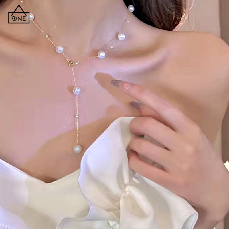 COD❤️สร้อยคอไข่มุกเรียบง่ายสไตล์ฝรั่งเศสสำหรับผู้หญิง พู่ห้อยคออเนกประสงค์แบบไฮเอนด์-a.one