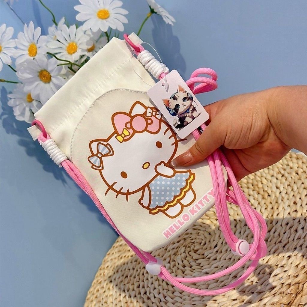 Hello Kitty Halter Bag กระเป๋าใส่มือถือและเหรียญ การ์ตูน.Crossbody ออกแบบป้องกันหายและปลอดภัย เหมาะสำหรับใช้งานในวันธรรมดาหรืองานเลี้ยง - รูปที่ 2