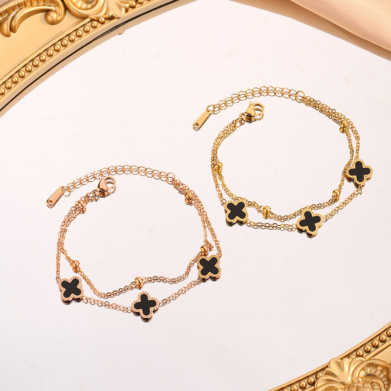 เวอร์ชั่นเกาหลี Simple Four-Leaf Clover สร้อยข้อมือหญิงแฟชั่นโซ่สองชั้นไทเทเนียม